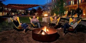 People Seating around the camp fire